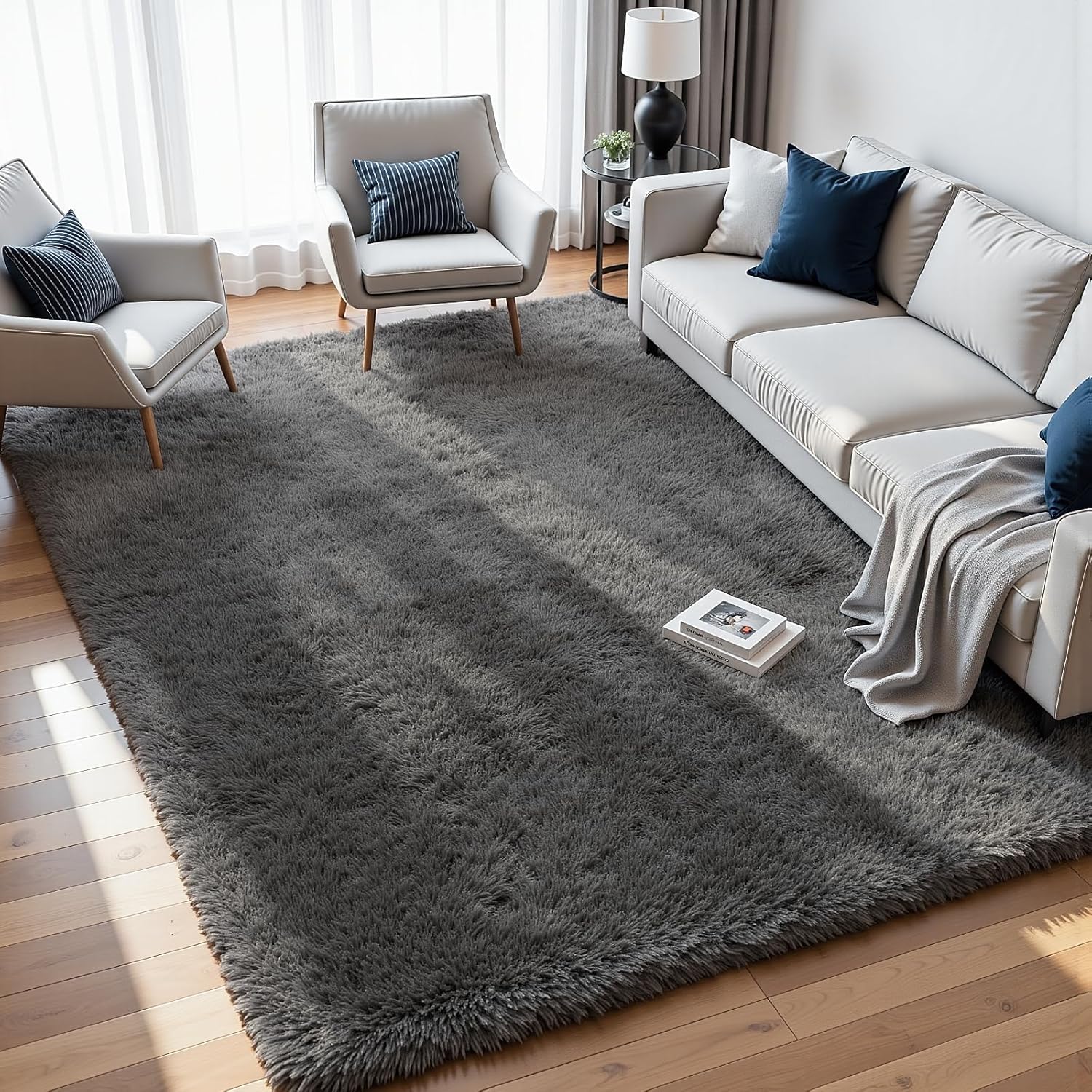 fuzziness-8x10-grey-fluffy-shag-area-rug-for-living-room-thick-memory-foam-01 An 8x10 rectangular Fuzziness grey fluffy shag area rug with a modern tie-dye pattern on a living room floor.