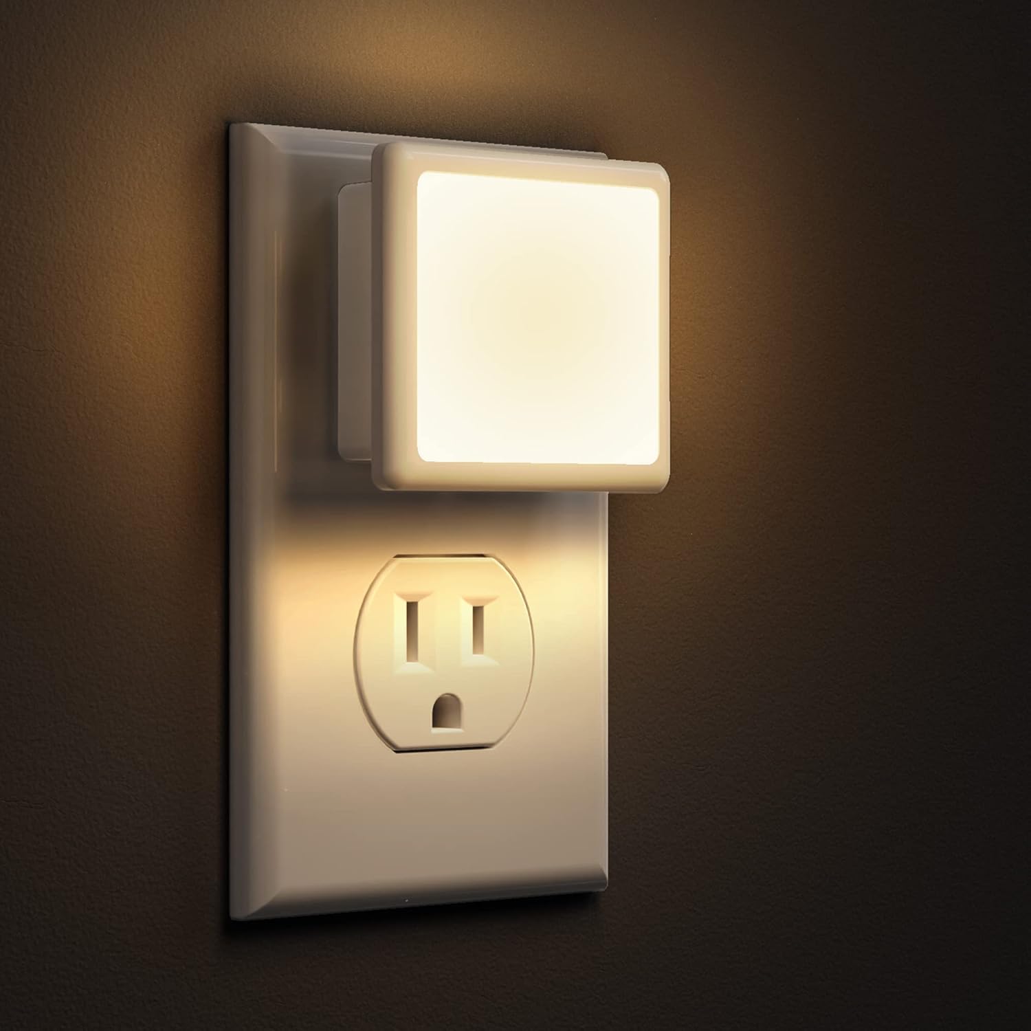 l-lohas-led-2-pack-plug-in-night-lights-dusk-to-dawn-sensor-soft-white-3000k-01 Two L LOHAS LED square plug-in night lights with a glossy white finish, emitting a soft glow.